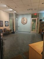 Our waiting room at Eastwind Healing Center, with a cellphones off policy, peaceful music, reflective books, and 9.5pH Kangen water.